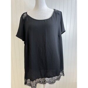 Torrid Sz 3 Black top. Lace shoulder and hem. Deed "V" back. Perfect summer top.